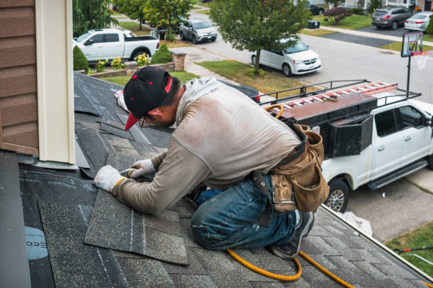 Professional Roofing technician working in Ossian, IN